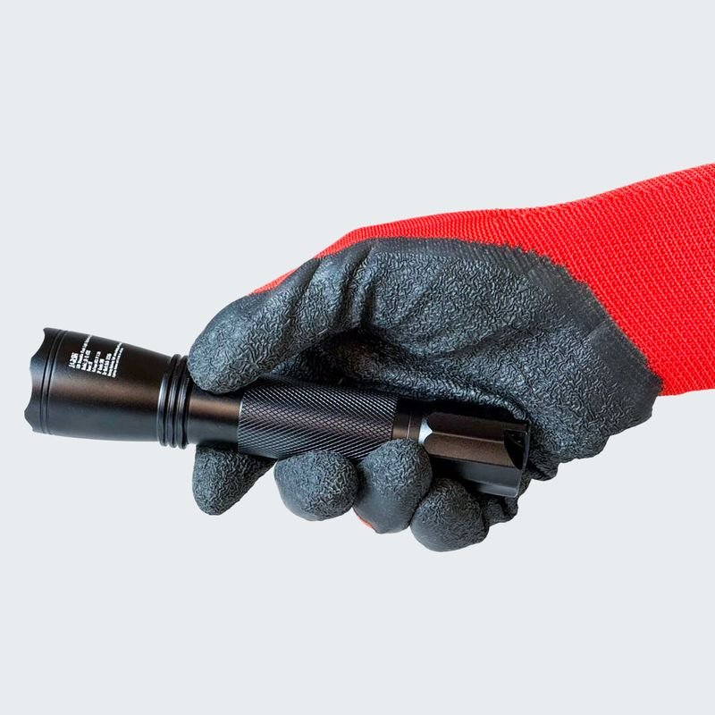 ATEX Flash Light in a gloved hand