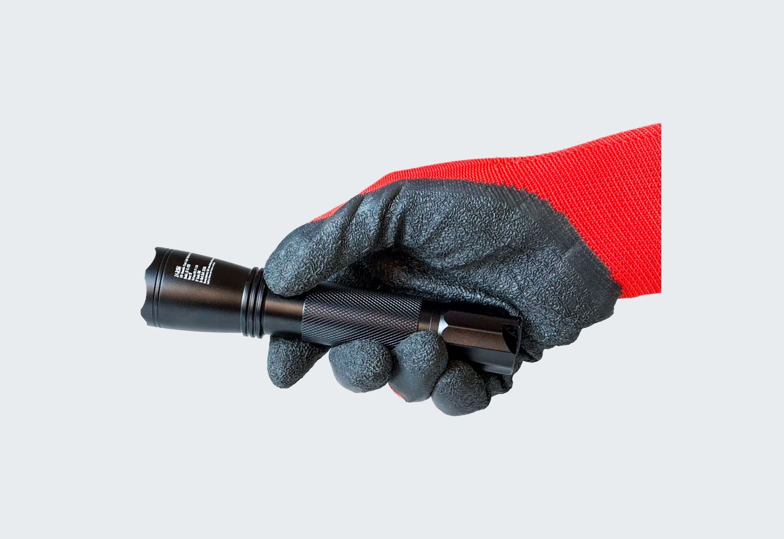 Jarsh ATEX Flash Light JS-IL-ATEX held in a gloved hand