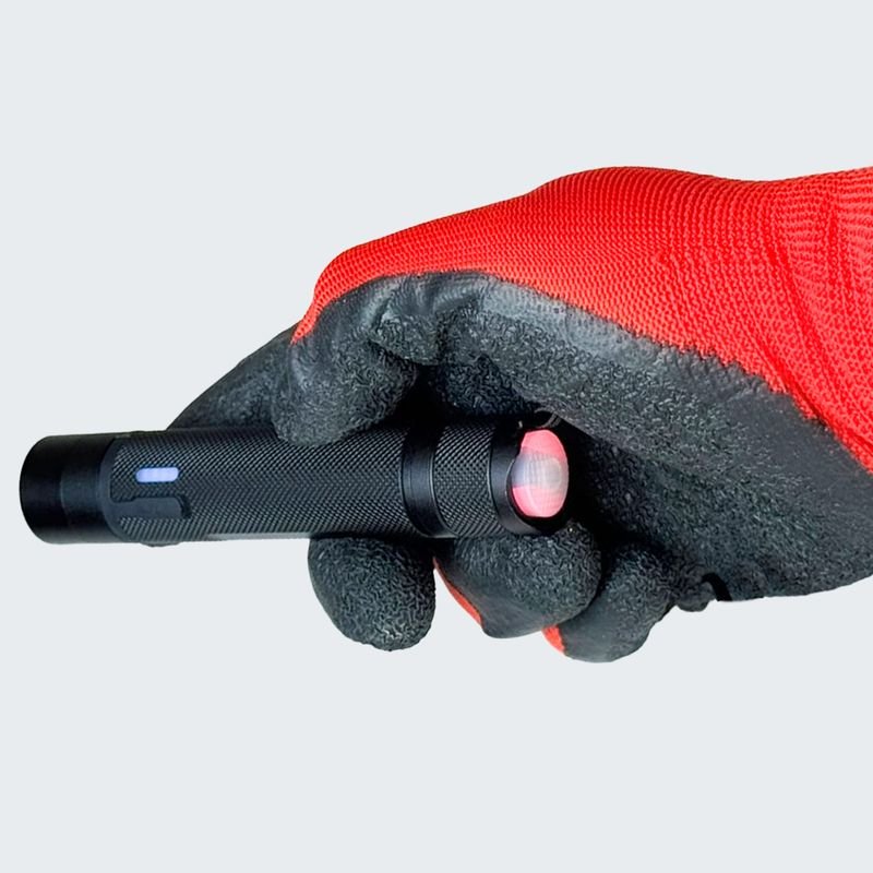 ATEX Micro Flash Light in a gloved hand