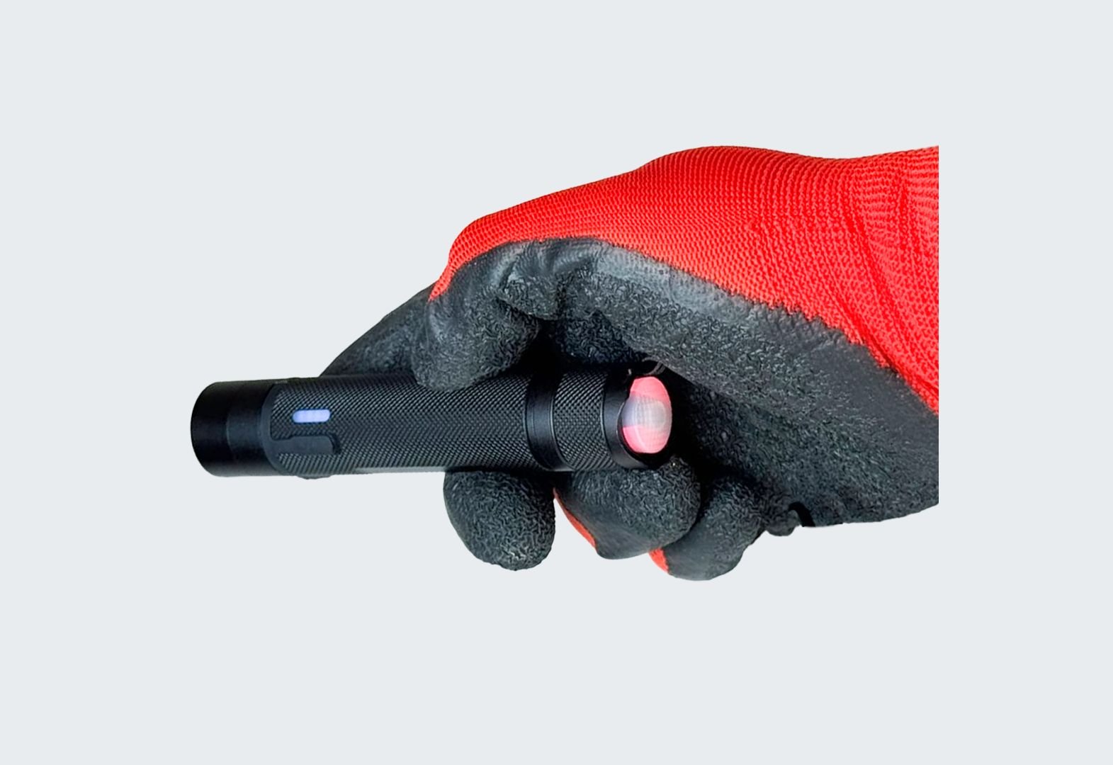 Jarsh ATEX Micro Flash Light JS-FL-ATEX-MICRO held in a gloved hand