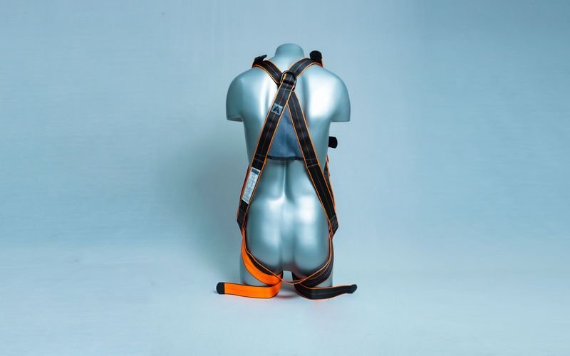 Jarsh EssentiA ESH-03(DT) dual-tone harness in black and orange webbing on a mannequin
