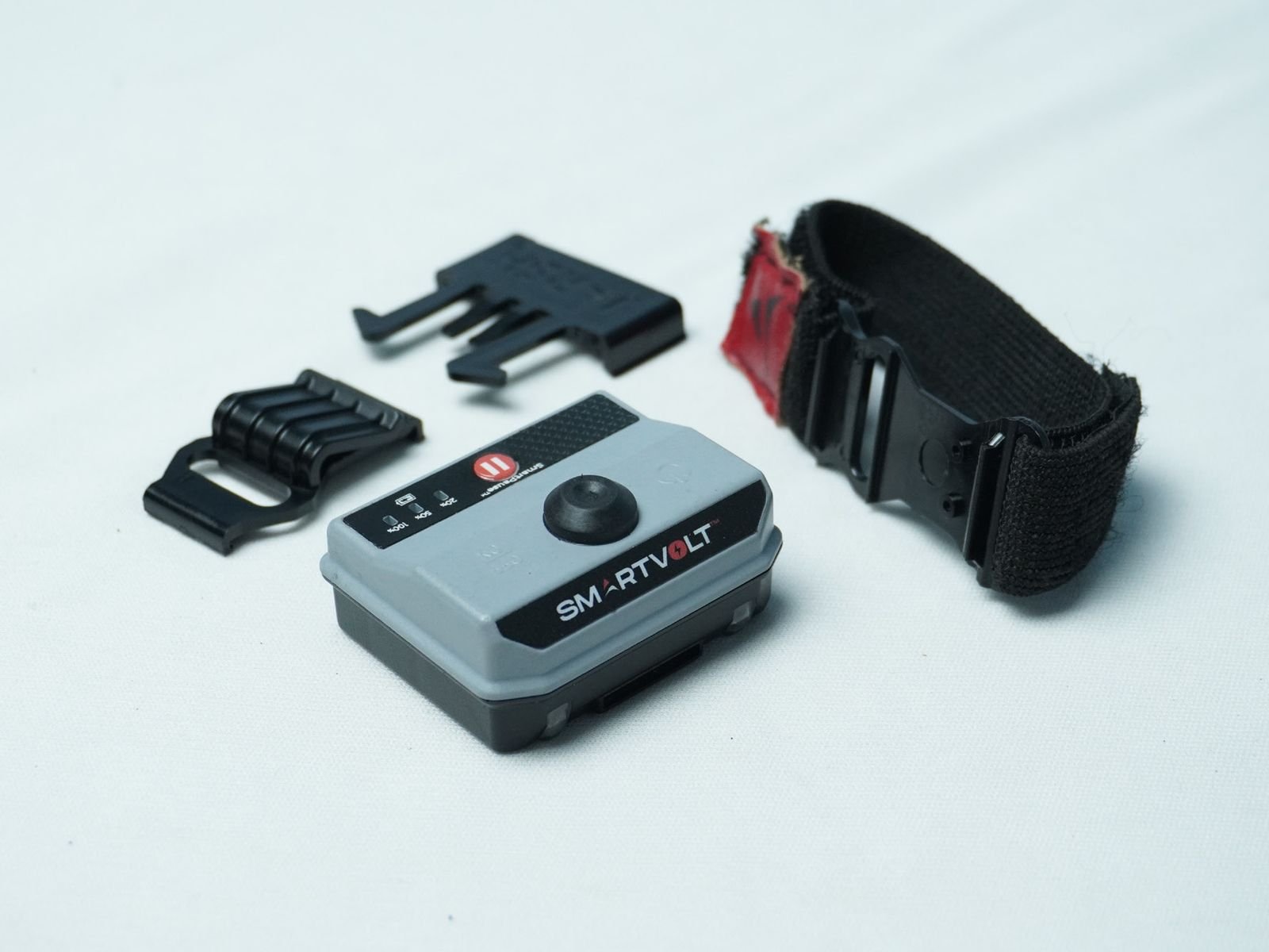 SmartVolt with its helmet clip, PPE clip and wrist band